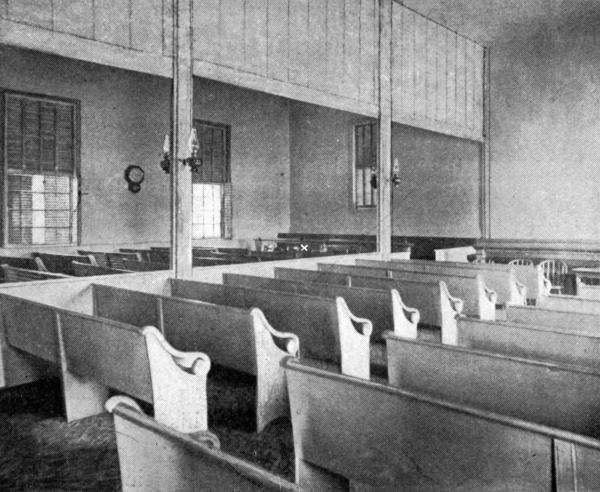 INTERIOR OF FRIENDS' MEETING-HOUSE
Whittier's usual seat marked, on left side, near "facing seats."
