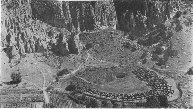 Looking down on the ruins of a prehistoric dwelling from
one of the upper caves in the Rito de las Frijoles, New Mexico