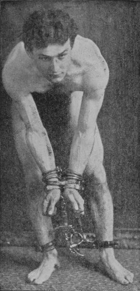 Houdini as Handcuffed and Manacled by the San Francisco
Police, July, 1899.